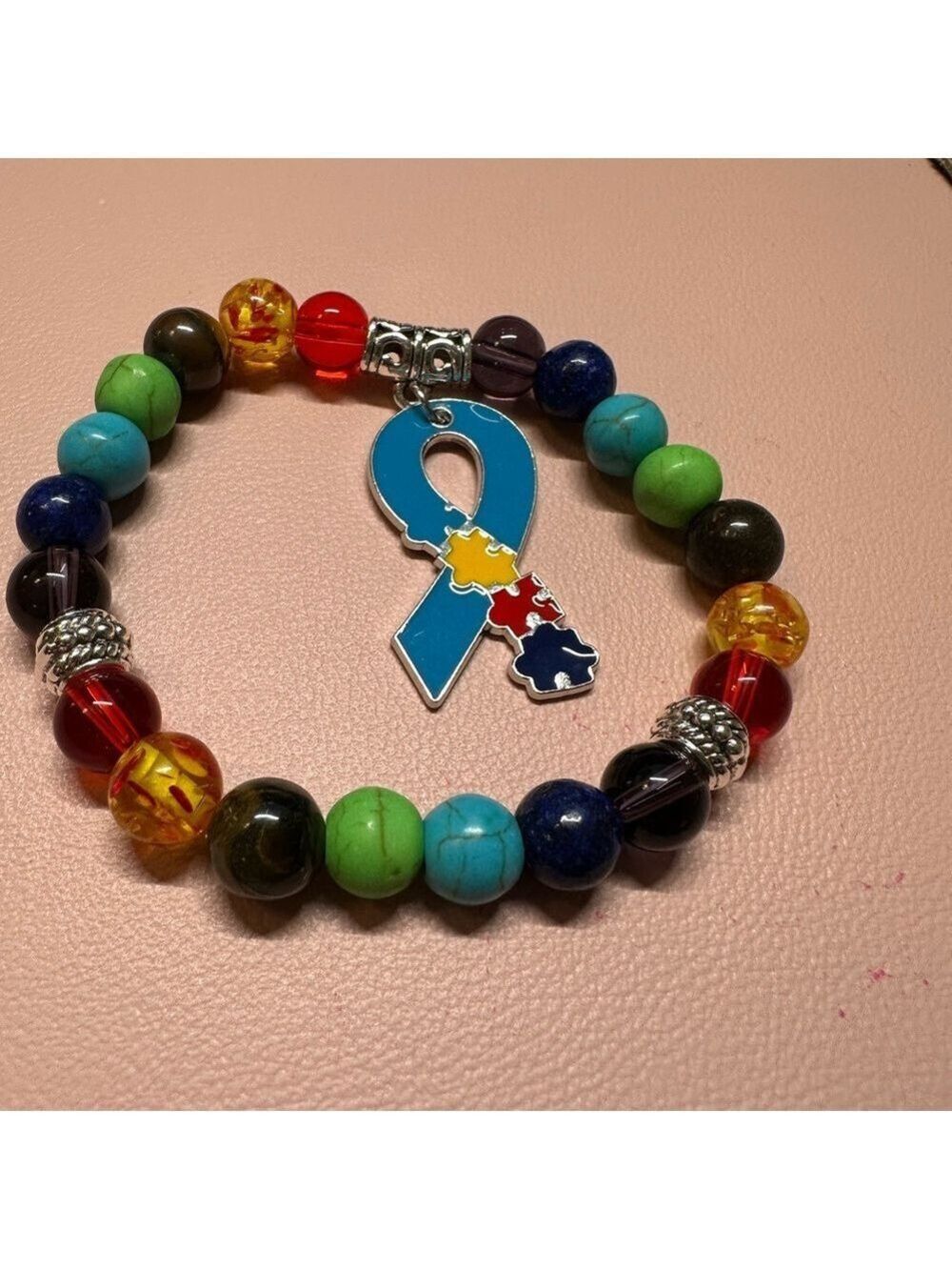 Autism Support Bracelet. Colorful Beaded Bracelet with Puzzle Ribbon Charm